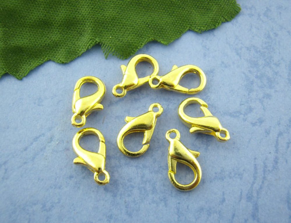 20 mosquetões 12 x 07 mm Ouro.