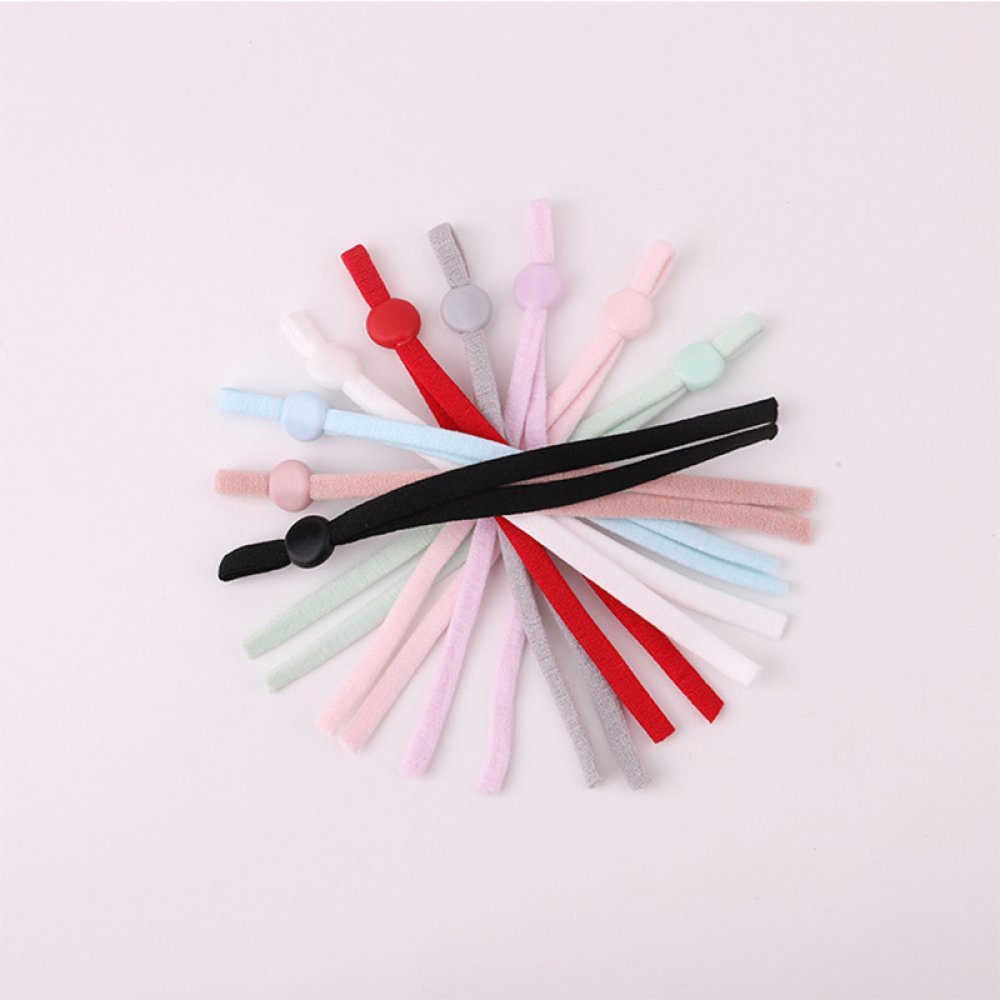 2 Faixas de cordão elástico branco com laço de fixação da máscara ajustável.