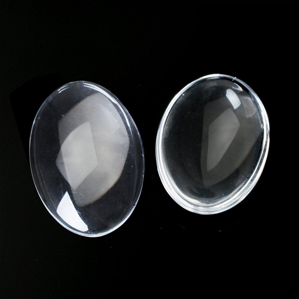 Cabochão oval 15 x 20 mm em vidro transparente rebarbado N°18 por 2 peças