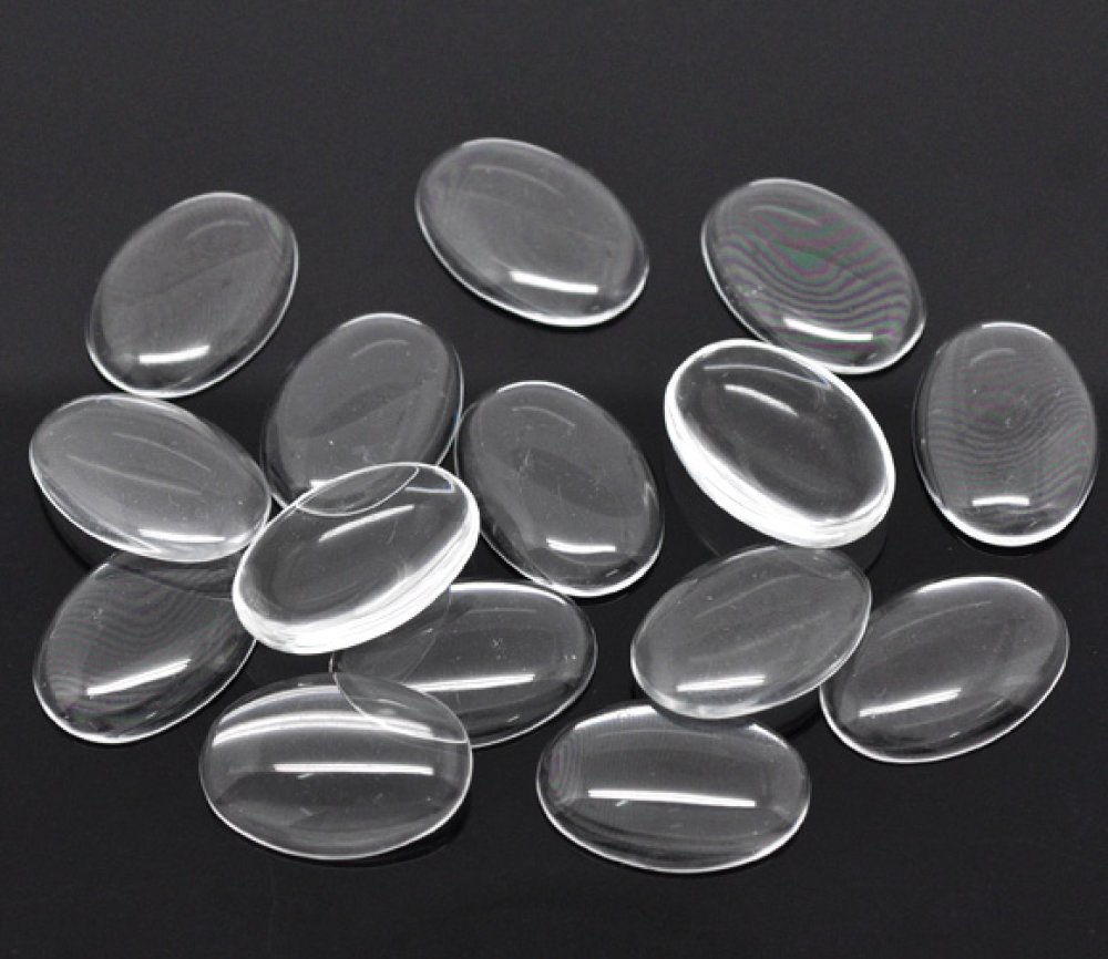 Cabochão oval 18 x 25 mm em vidro transparente rebarbado N°19
