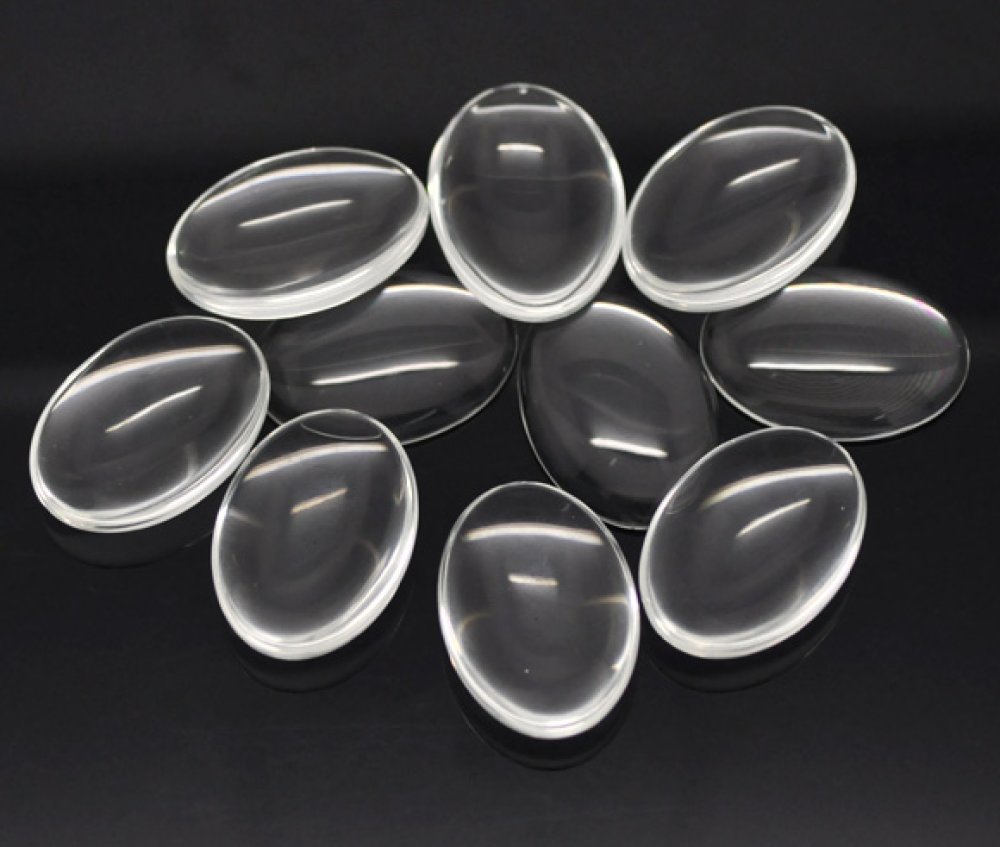 Cabochão oval de 25 x 35 mm em vidro transparente rebarbado N°20