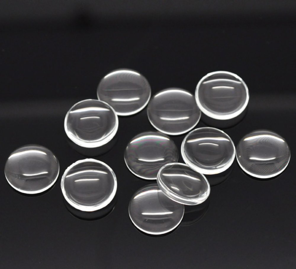Cabochão redondo de 12 mm em vidro transparente com rebarba N°03