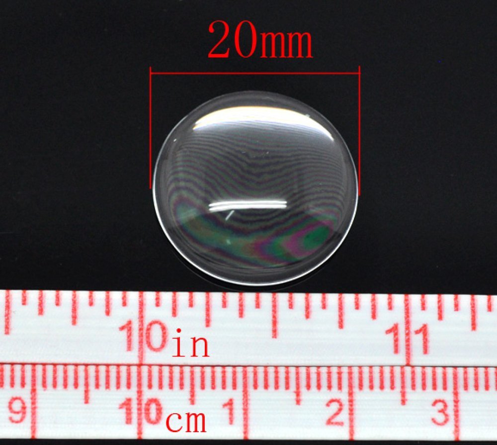 Cabochão redondo de 20 mm em vidro transparente com rebarba N°08