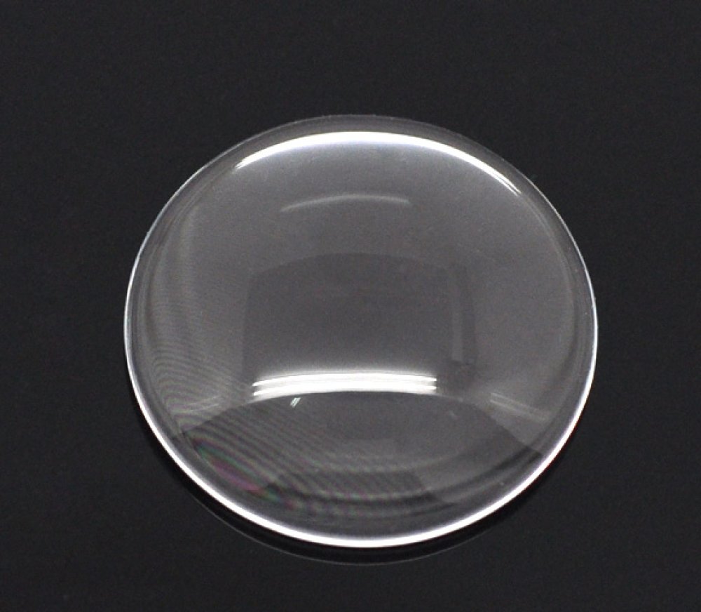Cabochão redondo de 20 mm em vidro transparente com rebarba N°08