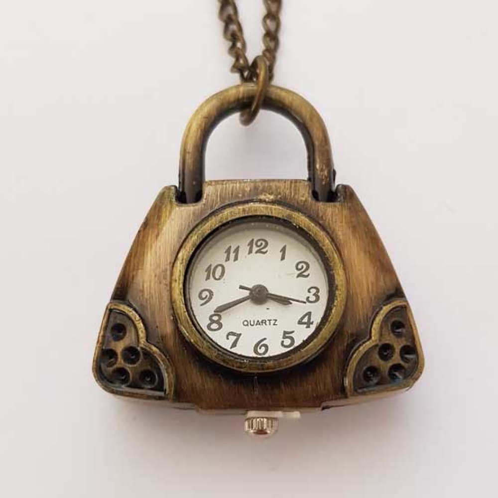 Relógio de bolsa em bronze antigo com corrente
