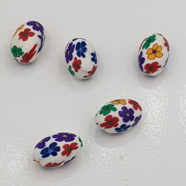 Perle Ovale p&acirc;te polym&egrave;re 10 x 15 mm Fleur N&deg;03