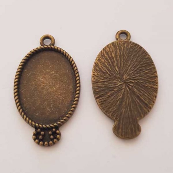 Support cabochon Ovale de 25 X 18 mm Bronze N&deg;04