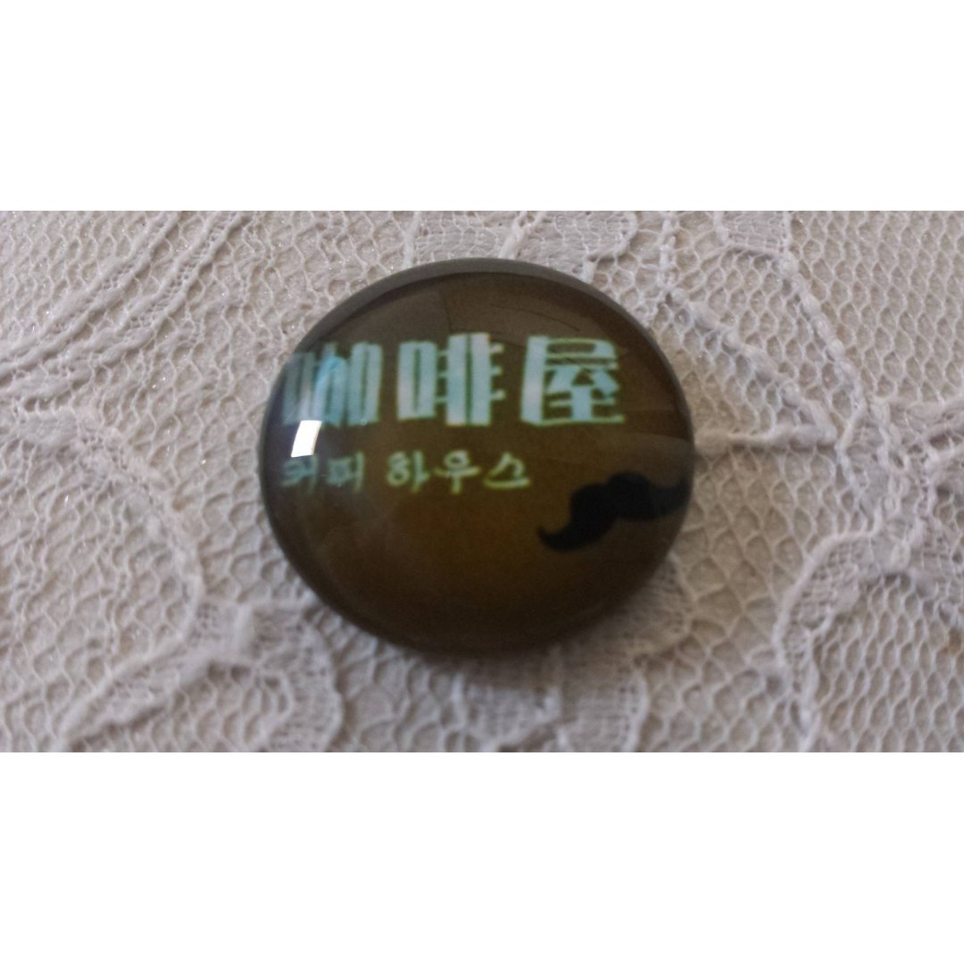 cabochão de vidro redondo 25mm bigode 042 