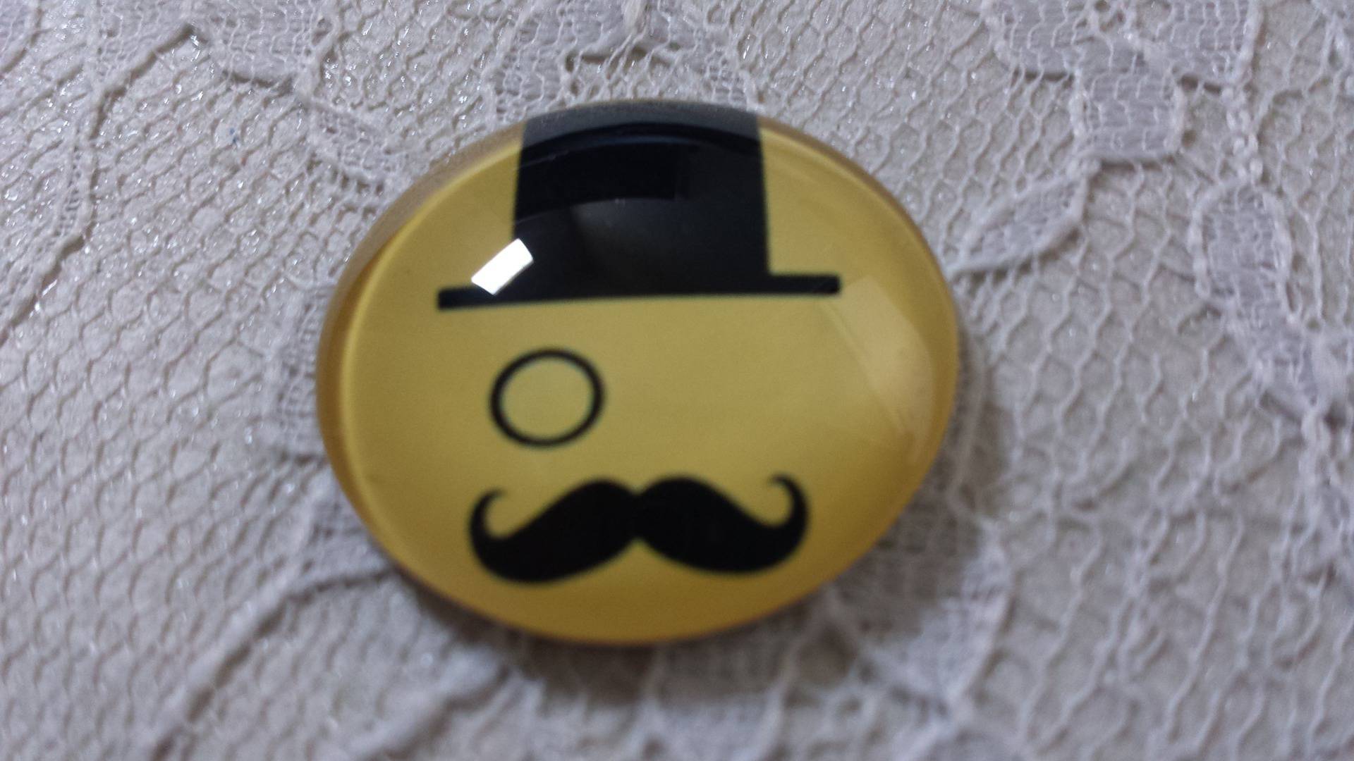 cabochão de vidro redondo 25mm bigode 023 