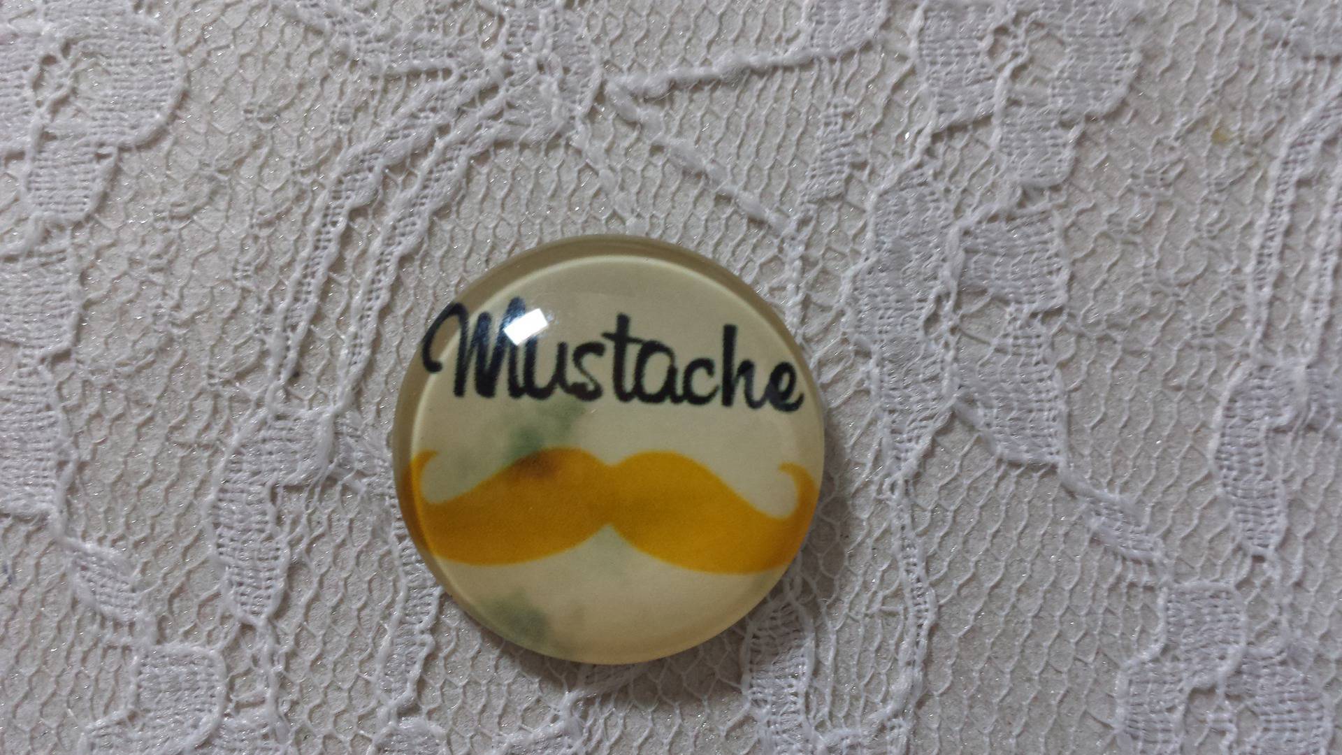 cabochão de vidro redondo 25mm bigode 008 