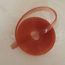 1 metro de cordão de pvc plano 5,8 x 1,9 mm Rosa antigo translúcido