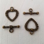 5 fechos de báscula com motivo de coração Bronze N°16