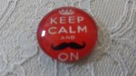 cabochão de vidro redondo 25mm bigode 043 