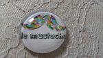 cabochão de vidro redondo 25mm bigode 010 