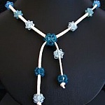 Notice du collier Boules de toupies Aqua