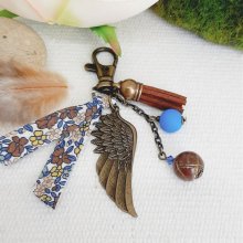 Porta-chaves ou jóia de bolsa com pingente de asa de anjo bronze de cor castanha e azul 