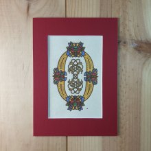 Letra O iluminada em estilo românico
