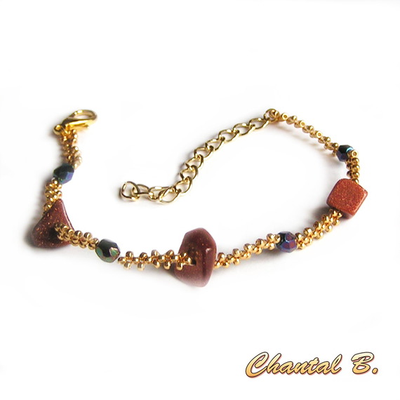 bracelete tecida em pedra solar natural e boheme de cristal azul e dourado