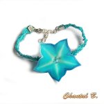 Bracelete de guipura de renda turquesa e a sua flor de seda turquesa pintada
