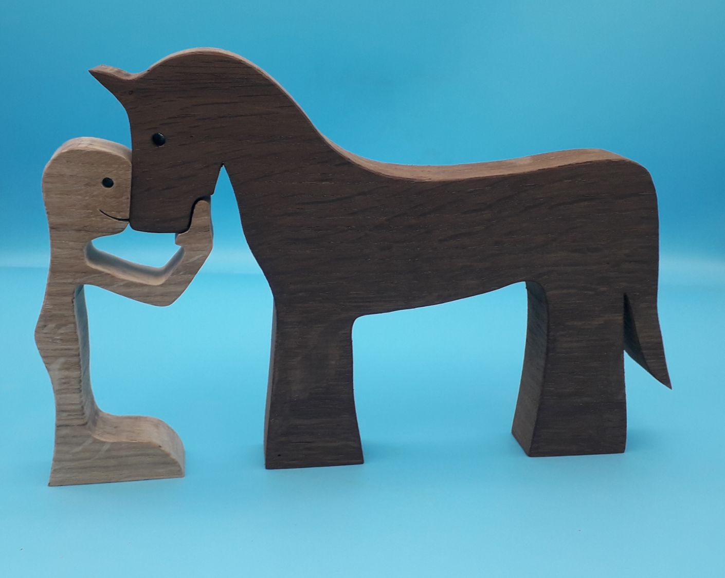 O homem e o seu cavalo estatueta de madeira