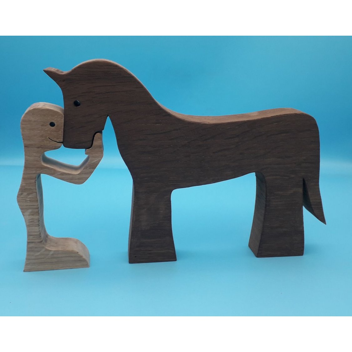 O homem e o seu cavalo estatueta de madeira