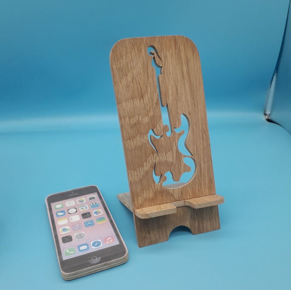 Suporte vertical para telemóvel com motivo de guitarra