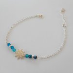 Pulseira de pedra ágata azul com leme sobre corrente de prata 925