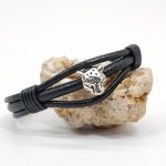 Pulseira de tigre sobre cordões de couro preto