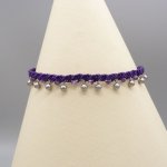 Anklet em micromacramé púrpura