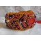 Pulseira de punho Red Jasper bordada com um cabochon Red Jasper, cristais Swarovski e missangas de sementes