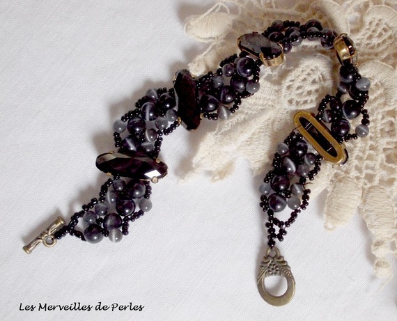 Pulseira da liberdade com cristais Swarovski e olho de gato de vidro