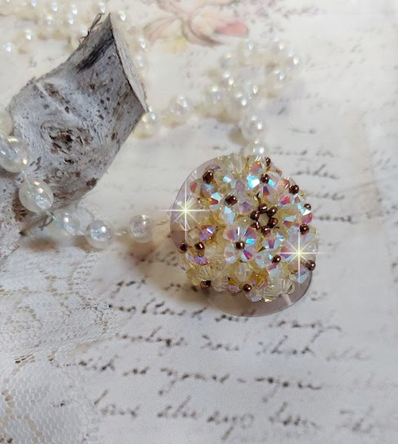 Anel Aurora com facetas e topos giratórios em cristal Swarovski
