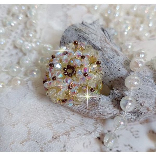 Anel Aurora com facetas e topos giratórios em cristal Swarovski
