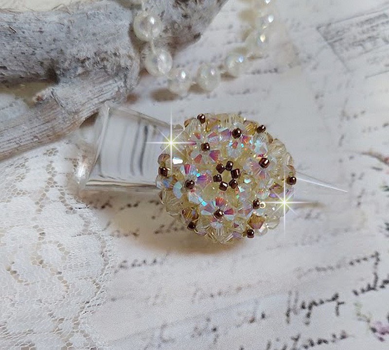 Anel Aurora com facetas e topos giratórios em cristal Swarovski