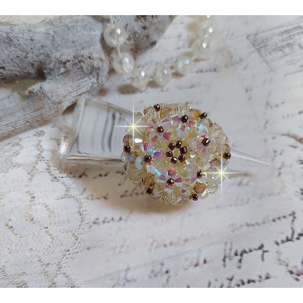 Anel Aurora com facetas e topos giratórios em cristal Swarovski