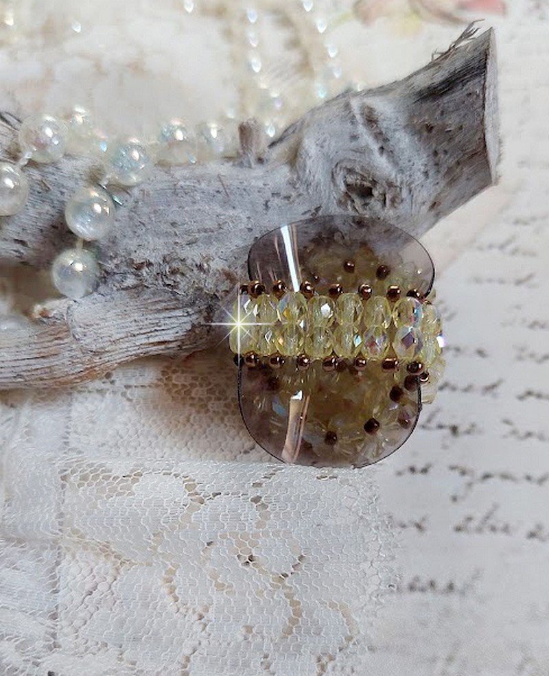 Anel Aurora com facetas e topos giratórios em cristal Swarovski