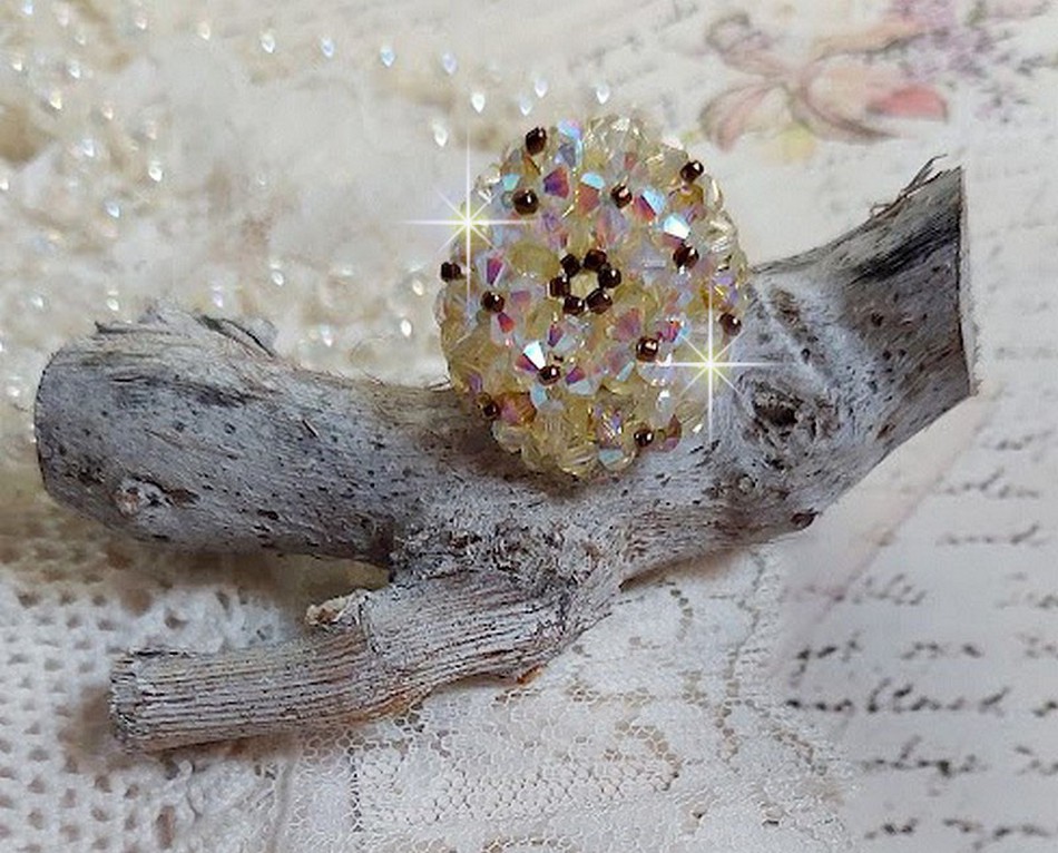 Anel Aurora com facetas e topos giratórios em cristal Swarovski