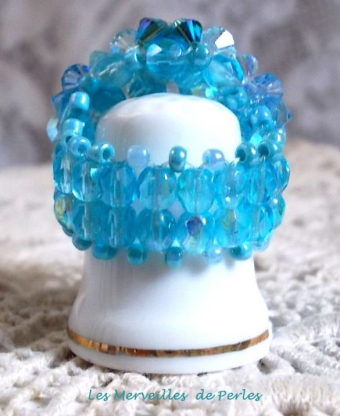 Anel celestial com facetas, p&eacute;rolas e giros de cristal