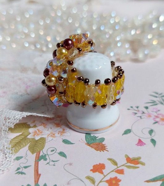 Anel de luz solar com facetas, contas de p&eacute;rolas e girat&oacute;rias de cristal Swarovski