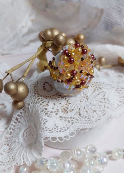 Anel de luz solar com facetas, contas de p&eacute;rolas e girat&oacute;rias de cristal Swarovski