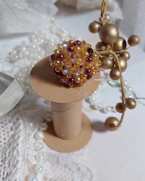 Anel de luz solar com facetas, contas de p&eacute;rolas e girat&oacute;rias de cristal Swarovski