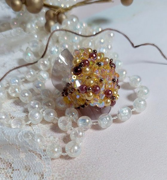 Anel de luz solar com facetas, contas de p&eacute;rolas e girat&oacute;rias de cristal Swarovski