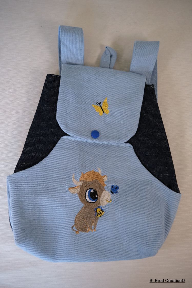 Mochila para crianças com touro azul celeste bordado, personalizável