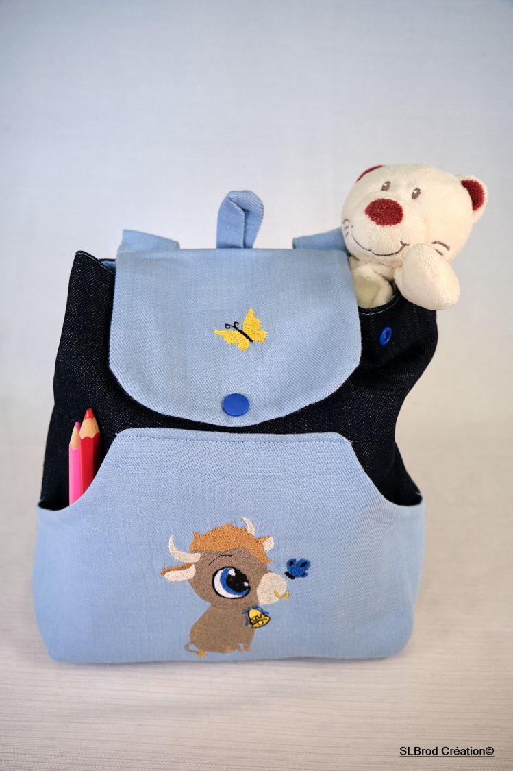 Mochila para crianças com touro azul celeste bordado, personalizável
