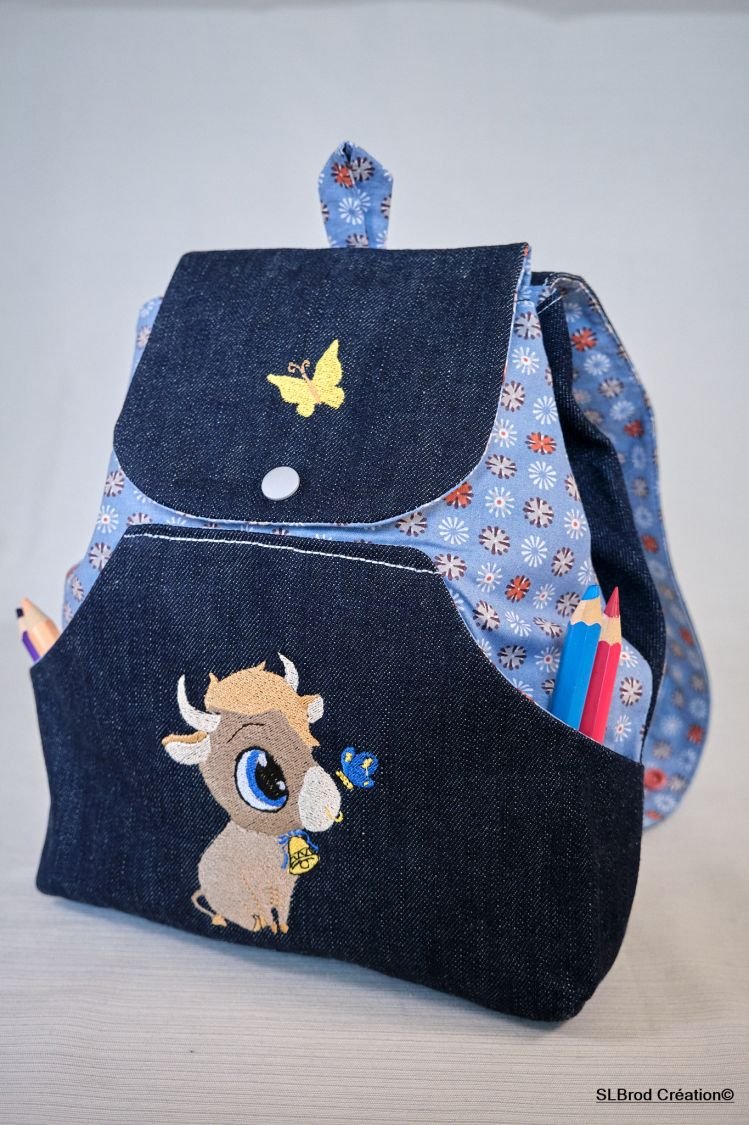 Mochila infantil bordada com touro de calças de ganga, personalizável