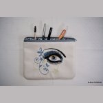 Mala plana com olho arabesco bordado